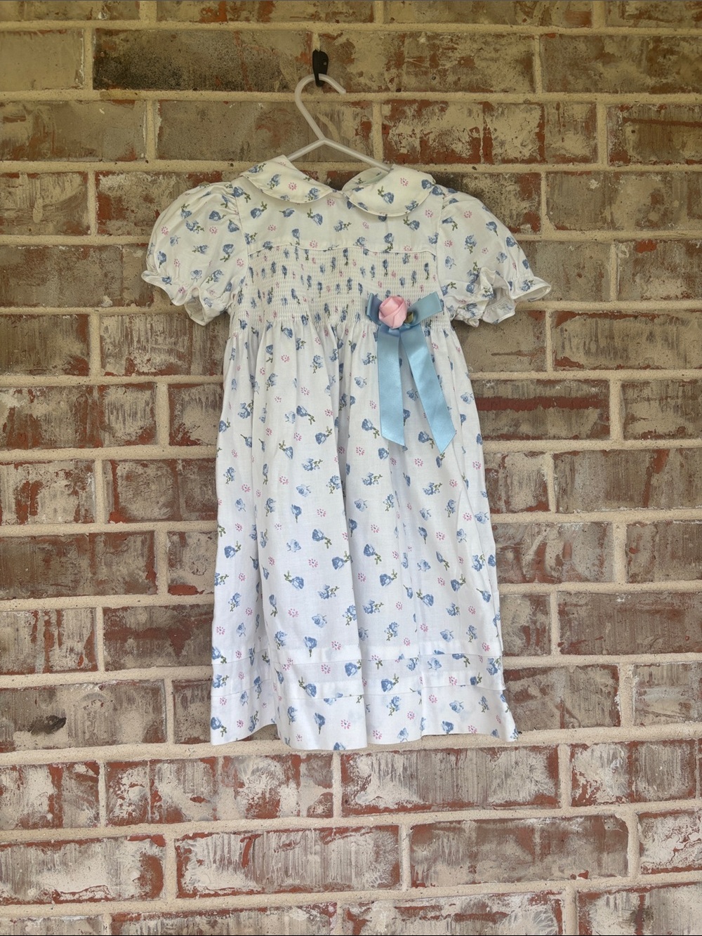 B.T. Kids Girls White Floral Smocked Dress with Blue Ribbon
